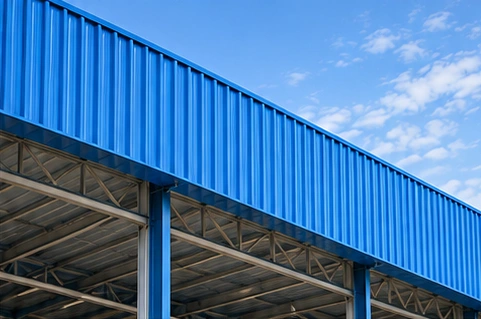 Blue metal roofing on an industrial structure